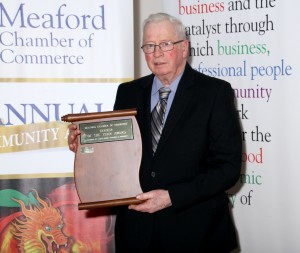 Albert McLean accepting the award for Farmer of the Year- Sponsored by Earth Power Tractors & Equipment